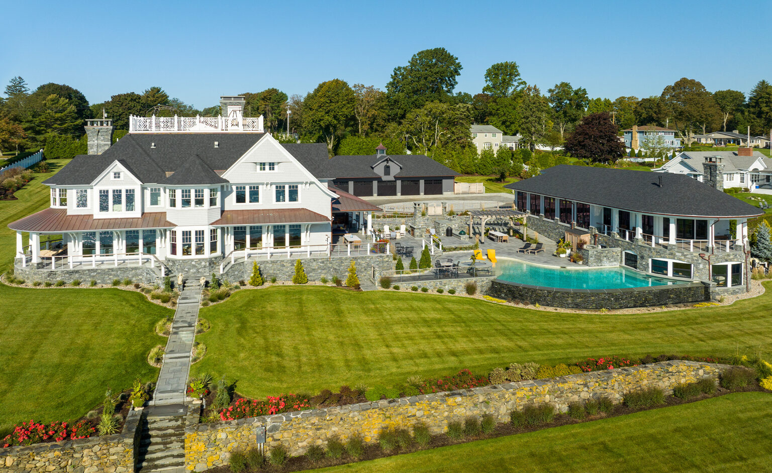 This luxury residence in Warwick Neck, Warwick, Rhode Island was designed by Cordtsen Design Architecture.